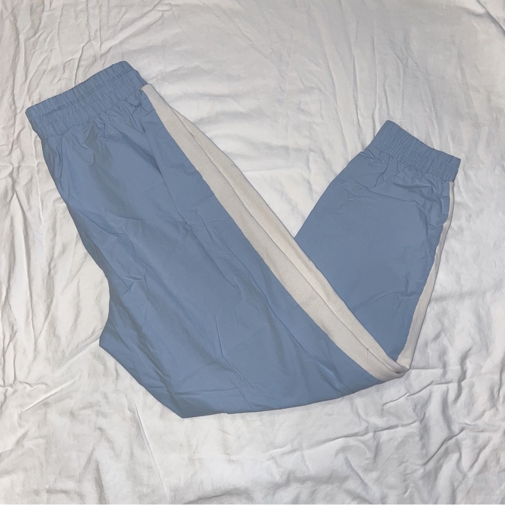 Fabletics track pants, light blue with white stripe, women’s size S